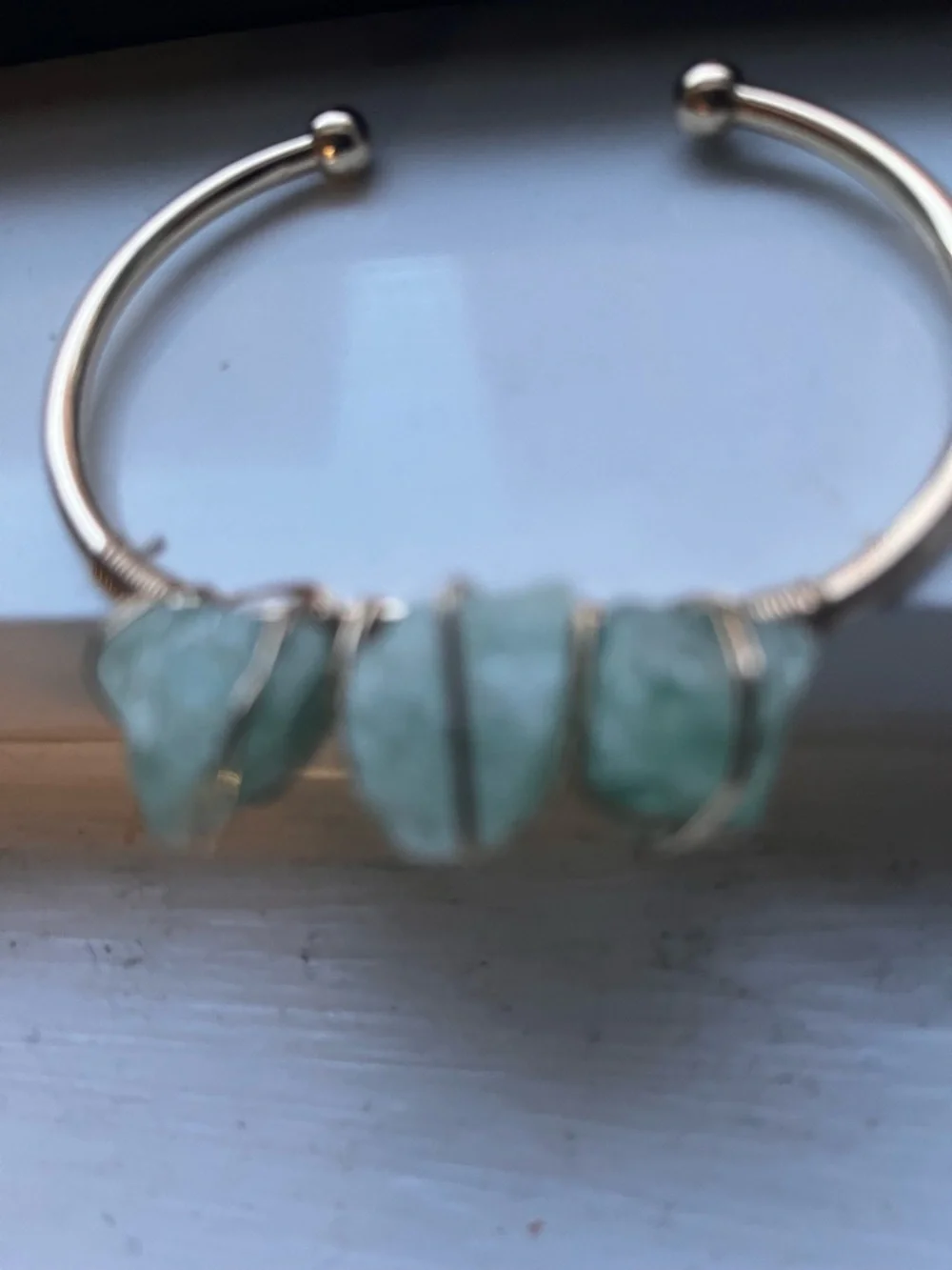Gold-Tone Cuff Bracelet with Pale Green Raw Stone Accents